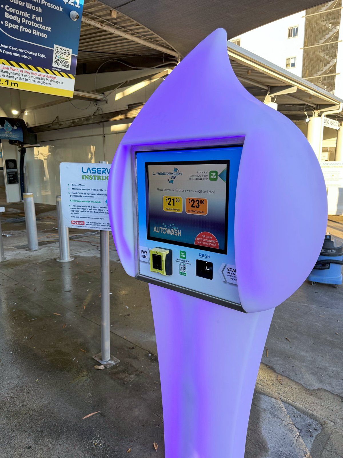 The purple-lit Paydrop plinth at dusk