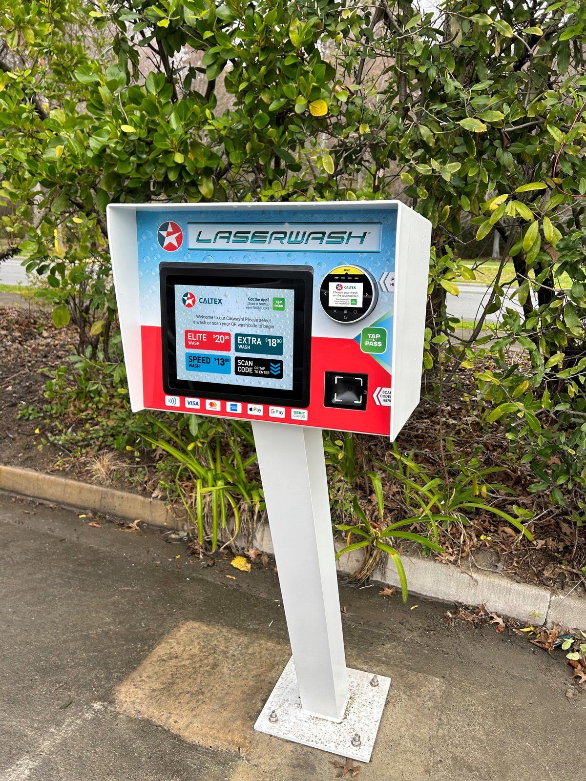 A Paydrop plinth in full colour at the site entry