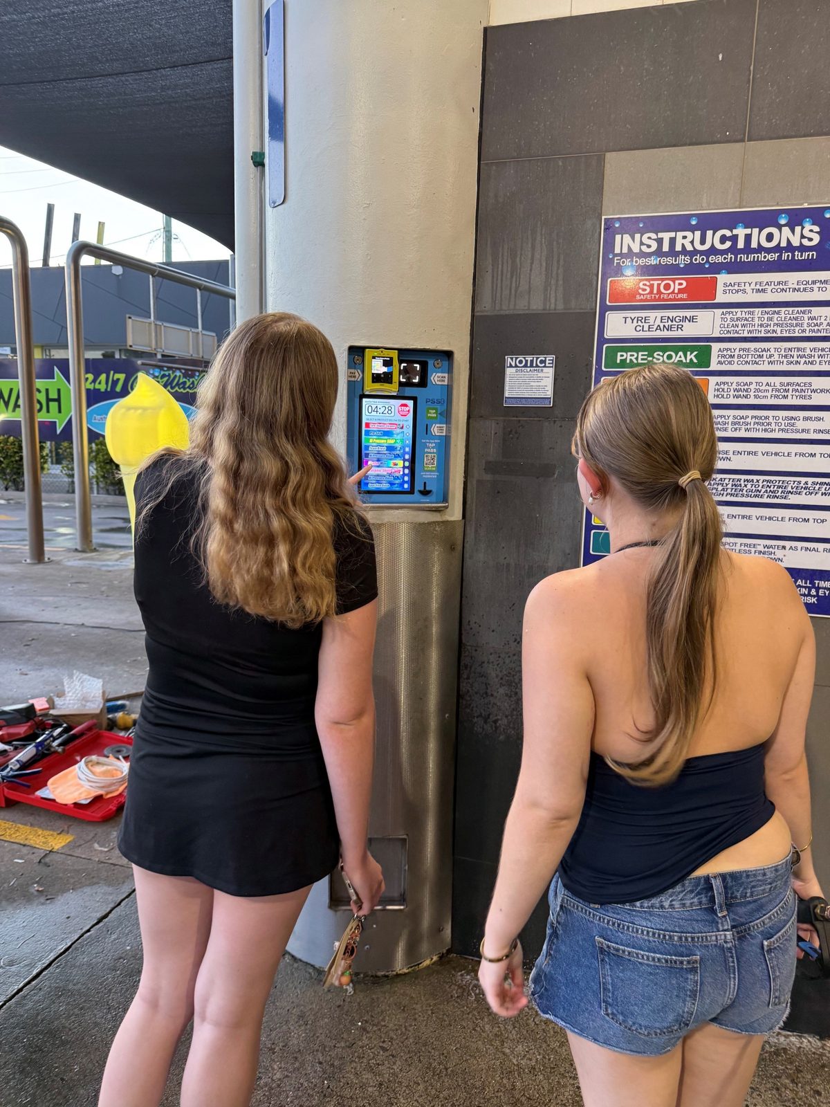 Customers at a PSS-retrofitted self-serve bay